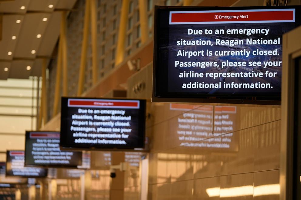 PHOTO: Signs display an "Emergency Alert" at Ronald Reagan Washington National Airport, Jan. 30, 2025, in Arlington, Va.