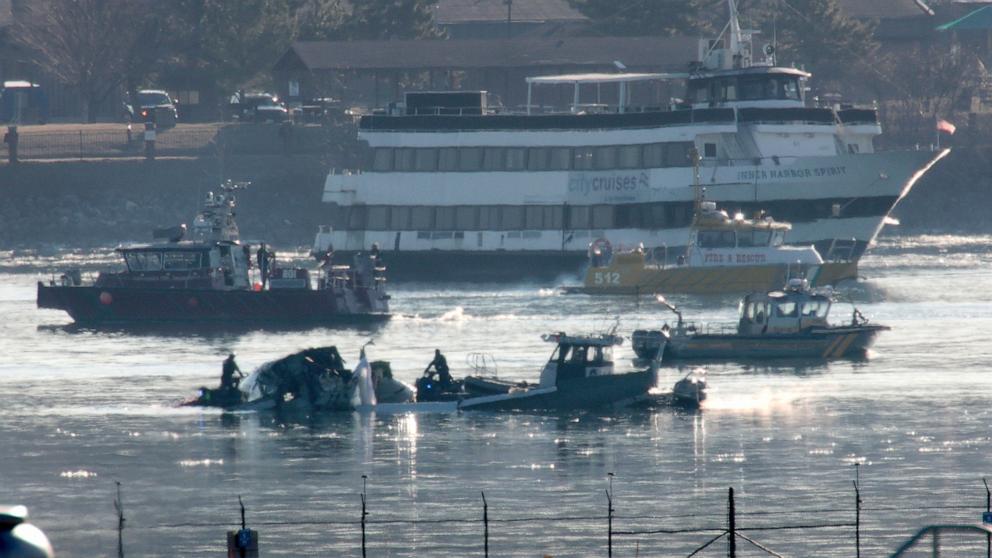 PHOTO: Emergency response units search the crash site of the American Airlines plane on the Potomac River after the plane crashed last night on approach to Reagan National Airport on January 30, 2025 in Arlington, Virginia.