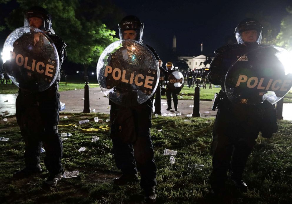 PHOTO: Members of the U.S. Secret Service hold a perimeter near the White House as demonstrators gather to protest the killing of George Floyd on May 30, 2020 in Washington, D.C.