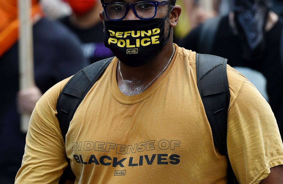 PHOTO: Demonstrators participate in a rally against "Trump's Police State - Defend the Right to Protest" in Washington, on July 25, 2020.