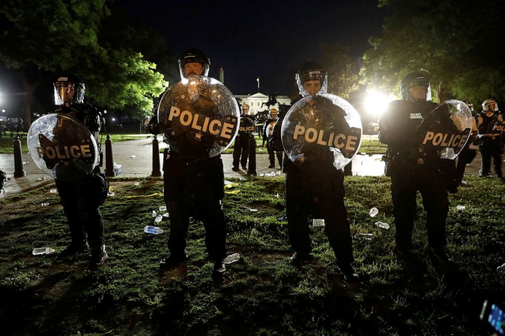 PHOTO: Security forces hold a perimeter near the White House as protests against the death in Minneapolis police custody of George Floyd, take place in front of the White House, in Washington, D.C., May 30, 2020.