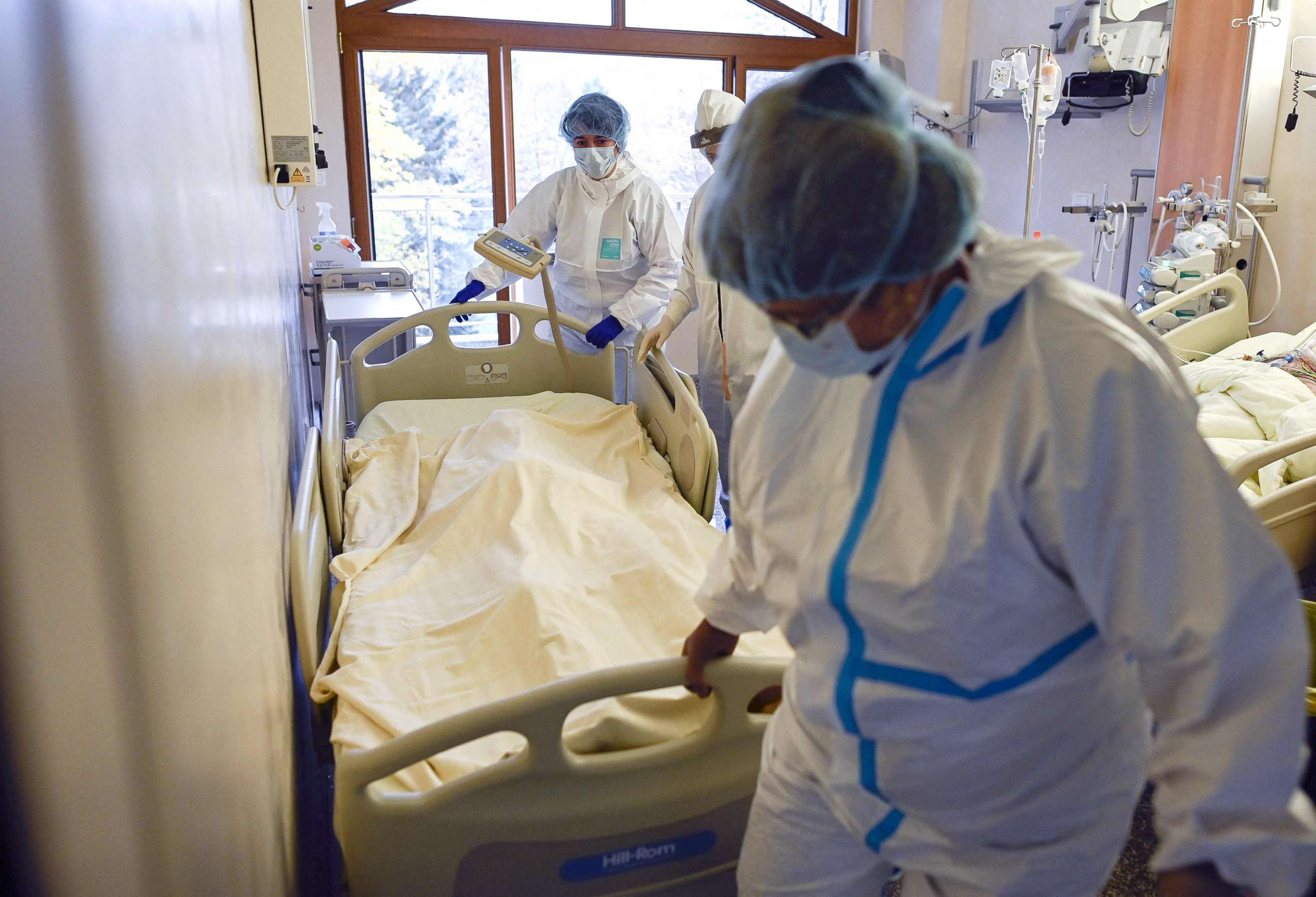 PHOTO: A medical staff member pushes a trolley bed carrying the body of a deceased Covid-19 patient in the intensive care unit of Lozenets Hospital in Sofia, Bulgaria, Nov. 9, 2021.