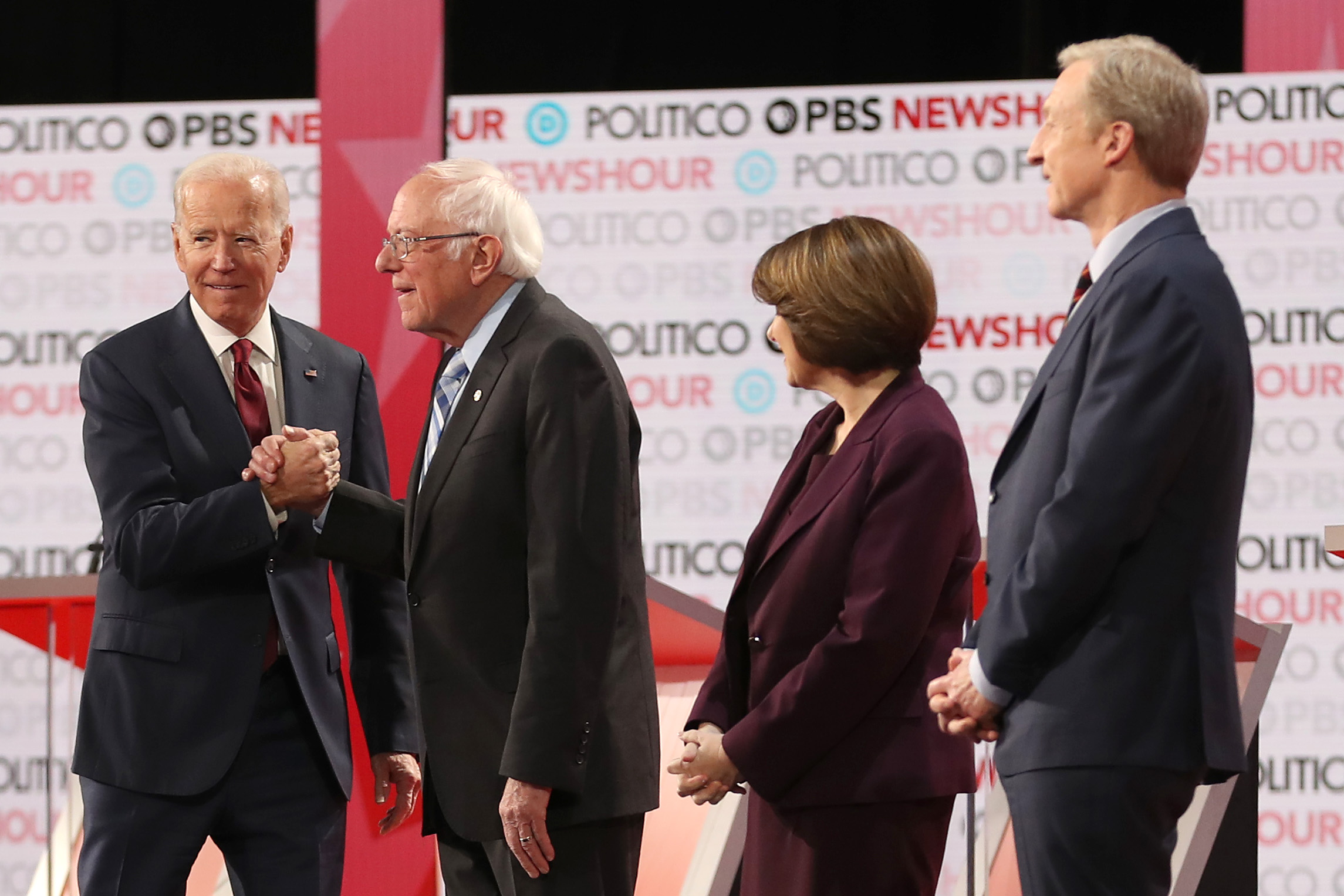 PHOTO:Democratic presidential candidate Former Vice President Joe Biden (L) greets , Sen. Bernie Sanders (I-VT) as Sen. Amy Klobuchar (D-MN), and Tom Steyer look on  before the Democratic presidential primary debate.