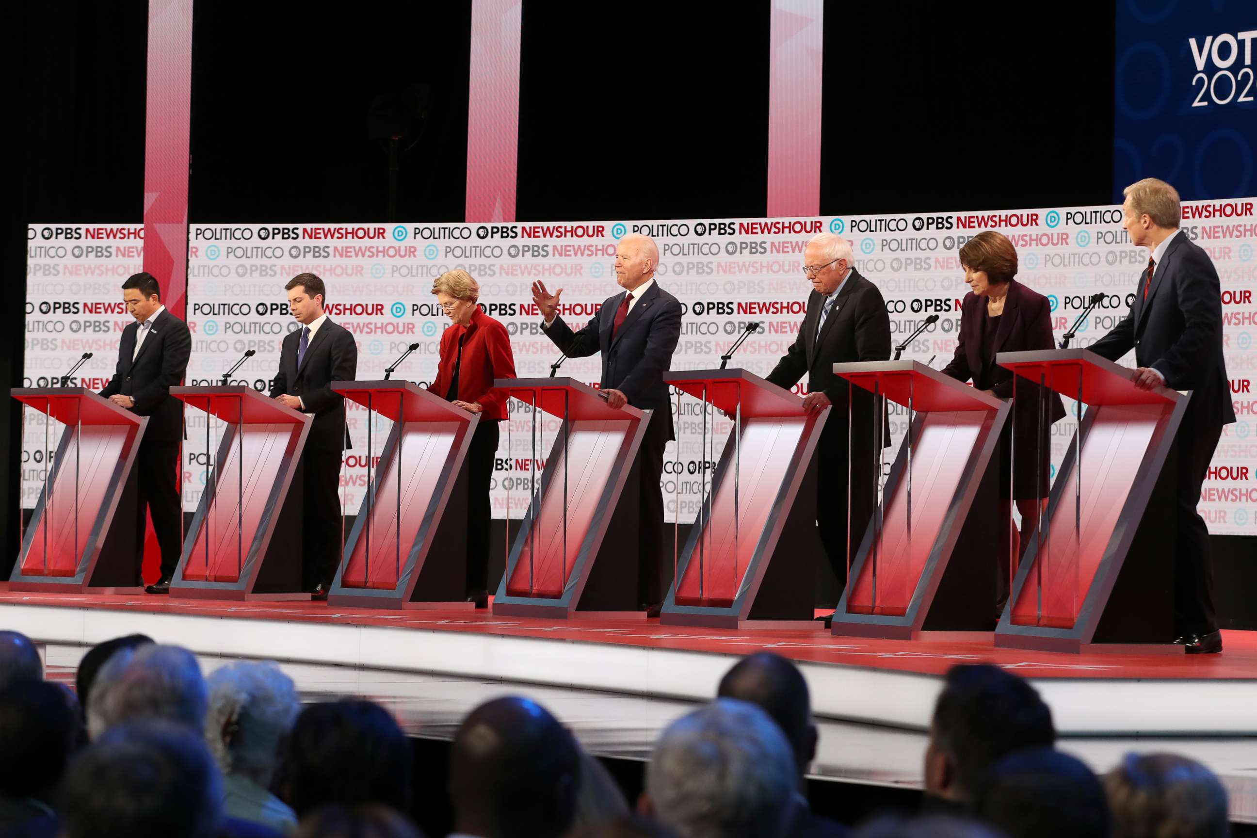 PHOTO: Democratic presidential candidates listen during the Democratic presidential primary debate at Loyola Marymount University on December 19, 2019 in Los Angeles, California.
