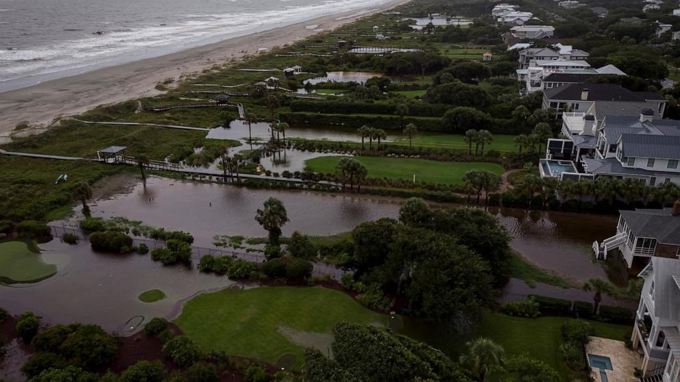 PHOTO: A view of flooded beachfront houses yards in Isle of Palms, S.C., Aug. 6, 2024.