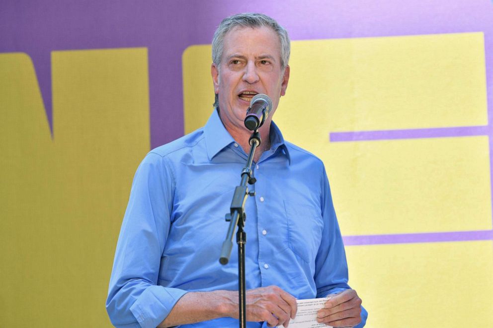 PHOTO: New York City Mayor Bill de Blasio speaks at Let's Get This Show on the Street: New 42 Celebrates Arts Education on 42nd Street, June 5, 2021, in Times Square New York.