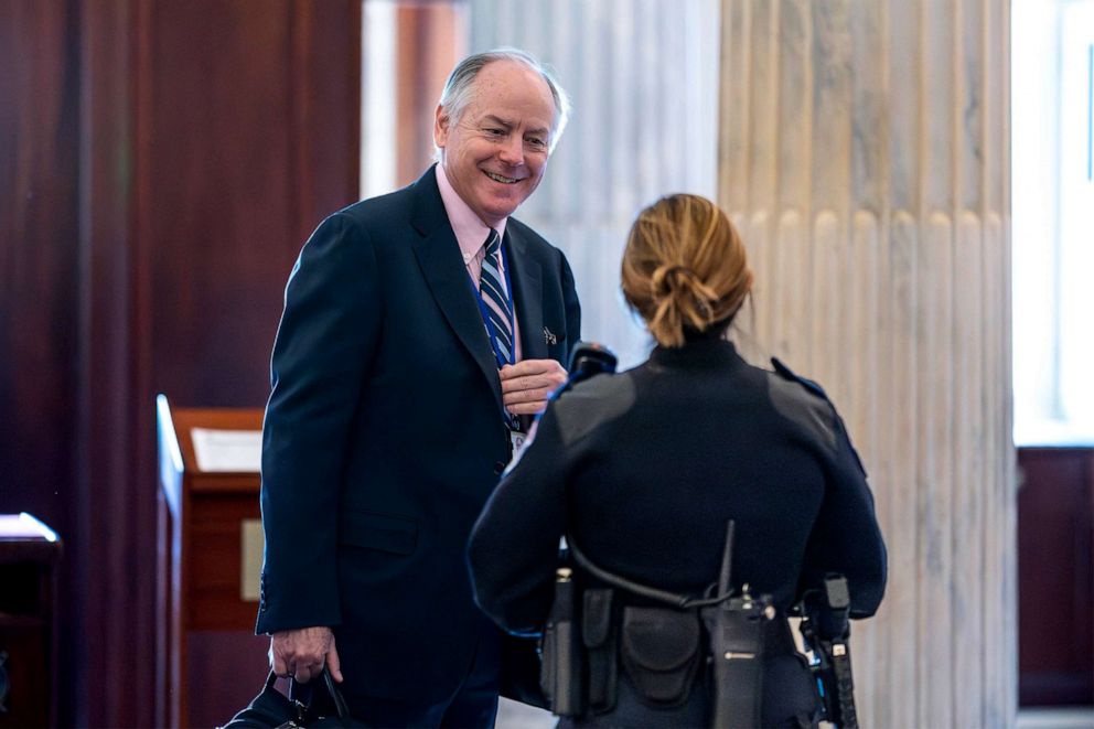 PHOTO: Steve Ricchetti, one of the top negotiators for President Joe Biden on the debt limit crisis, is greeted by a Capitol Police office after he passed through security to return to closed-door mediation, at the Capitol in Washington, May 23, 2023.