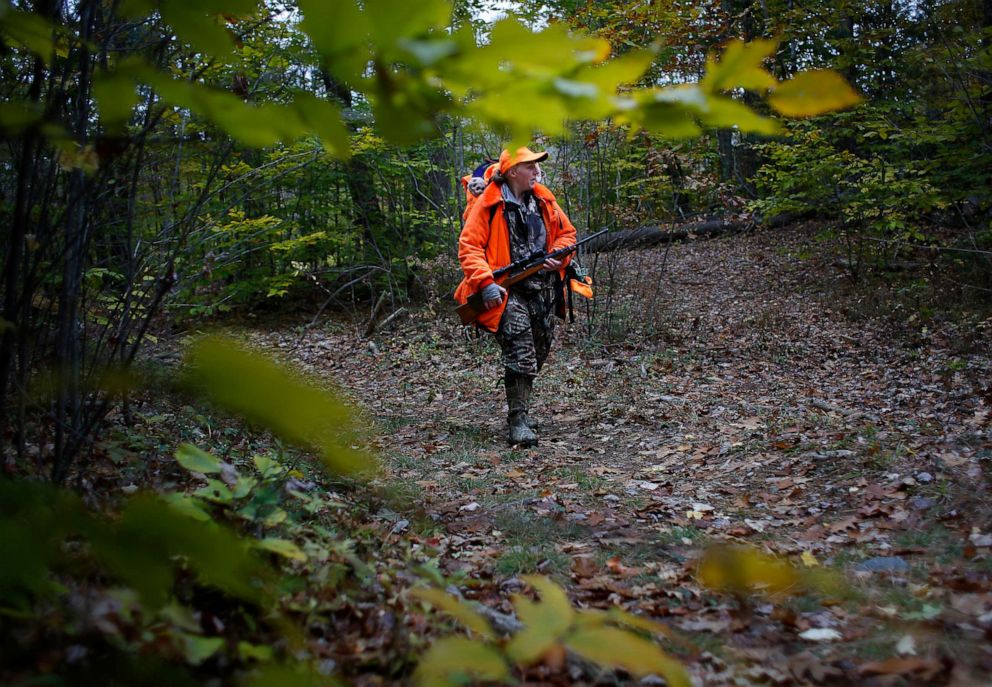 PHOTO: Christine Barnes hunts for deer, Oct. 27, 2018 in Acton, Maine.  