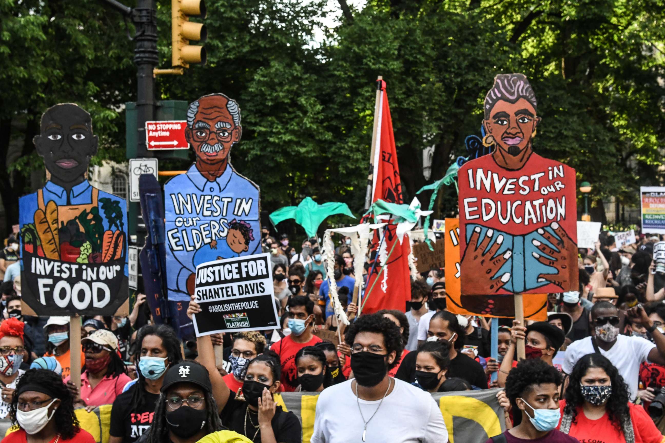 PHOTO: People begin a march out of a protest encampment on June 25, 2020, in a park near City Hall in New York.