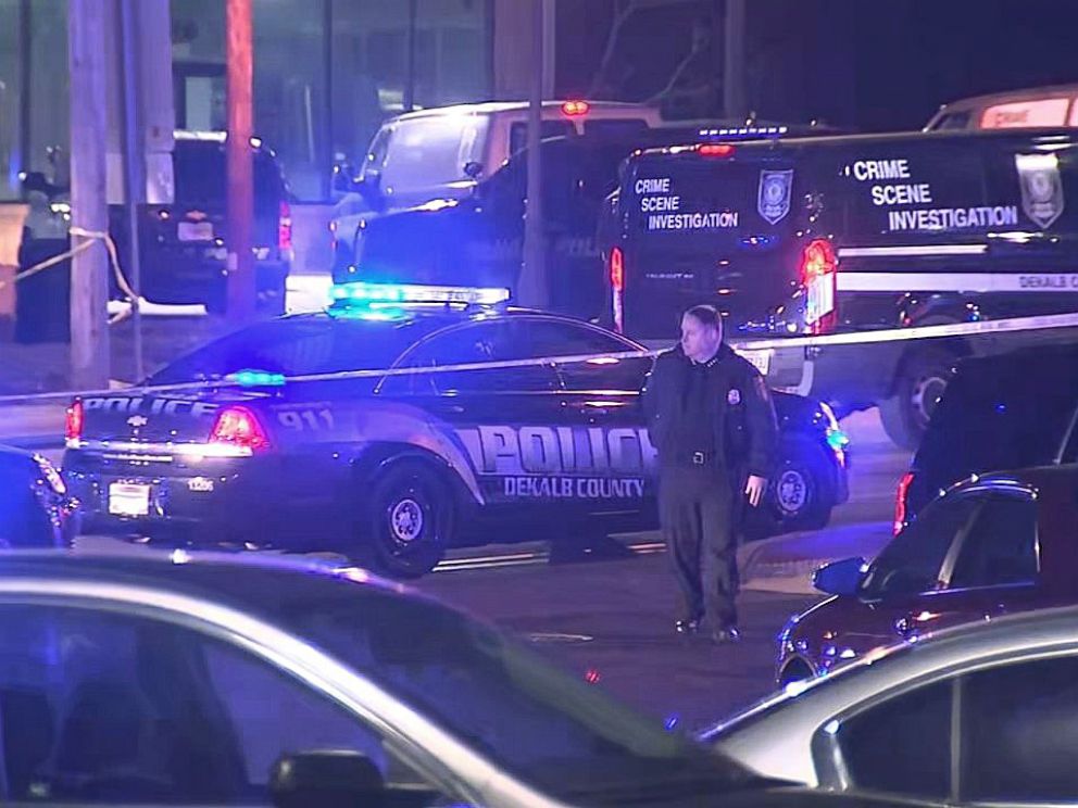   PHOTO: Officers at the scene where a DeKalb County police officer was shot dead during a roadside check on December 13, 2018. 