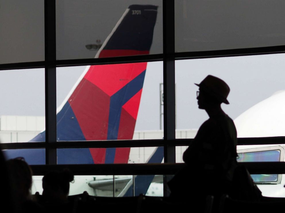 PHOTO: A passengers waits for a Delta Airlines flight in Terminal 5 at Los Angeles International Airport, May 4, 2017, in Los Angeles.