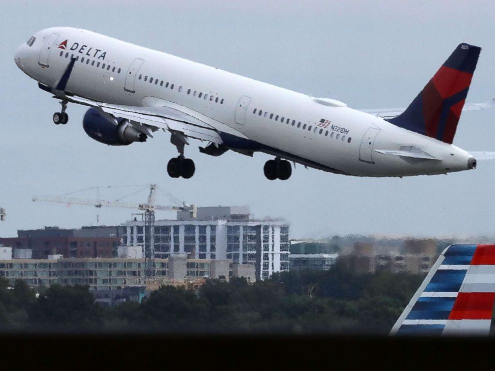 PHOTO: With the U.S. Capitol dome in the distance, a Delta airplane takes off from Ronald Reagan National Airport, Sept. 1, 2017, in Washington, D.C.