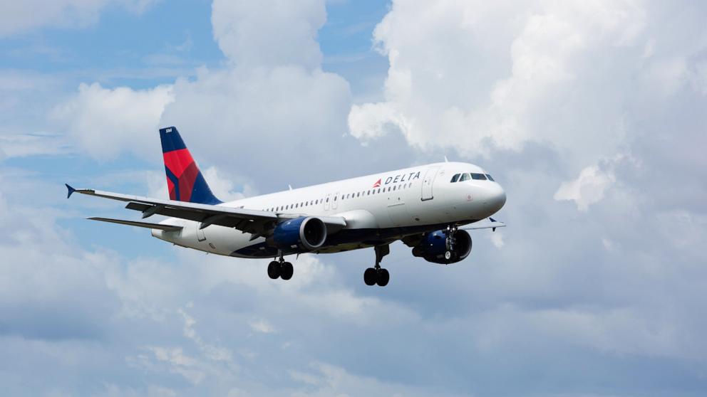 PHOTO: A Delta Air Lines aircraft lands at Miami International Airport.