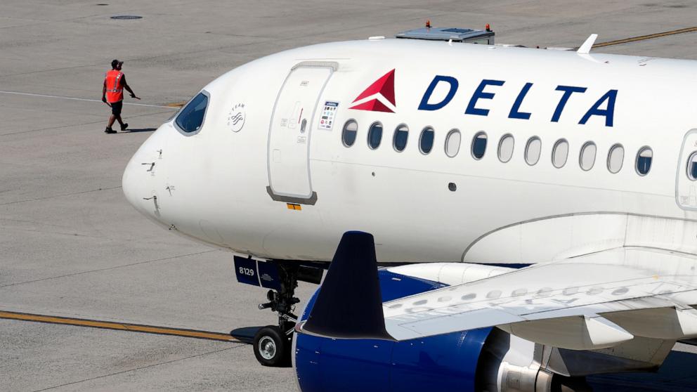 PHOTO: A Delta Air Lines jet leaves the gate, July 19, 2024, at Logan International Airport in Boston.