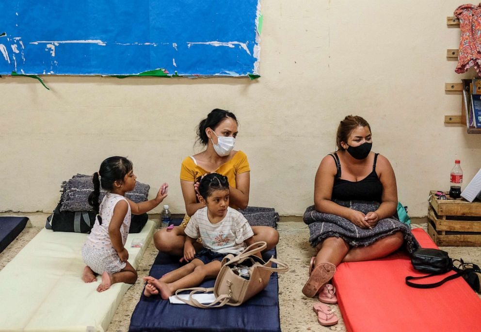 PHOTO: People rest in a shelter prior to the arrival of Hurricane Delta in Cancun, Mexico, Oct. 6, 2020. Delta rapidly intensified into a potentially catastrophic Category 4 hurricane on a course to hit Mexico and continue on to the U.S. Gulf coast. 