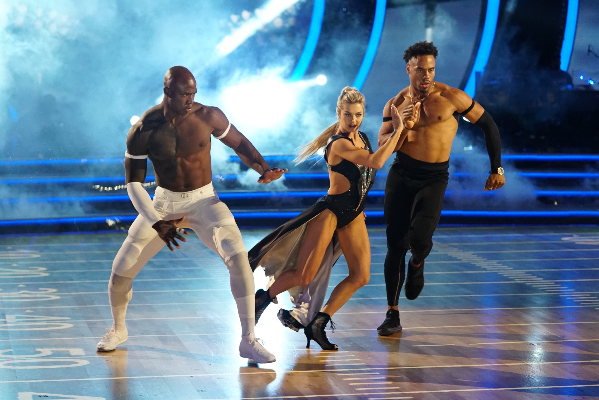 PHOTO: Former NFL star Demarcus Ware, left, suffered a dislocated finger but he, partner Lindsay Arnold and guest Rashad Jennings soldiered through on "Dancing with the Stars" on Monday, Oct. 15, 2018.