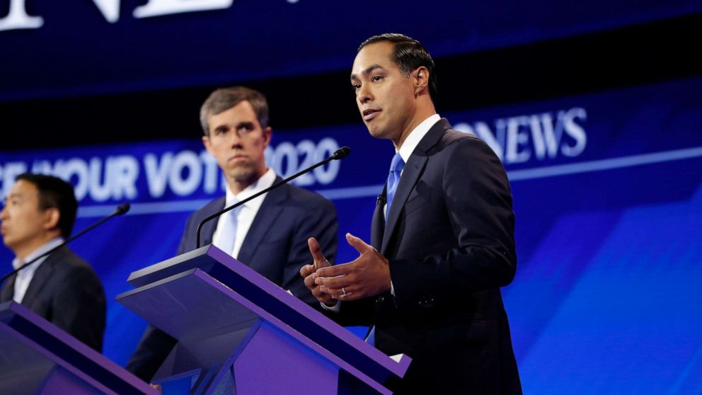 PHOTO: Beto O'Rourke watches while Julian Castro speaks during the third Democratic Primary Debate, in Houston, Sept. 12, 2019.