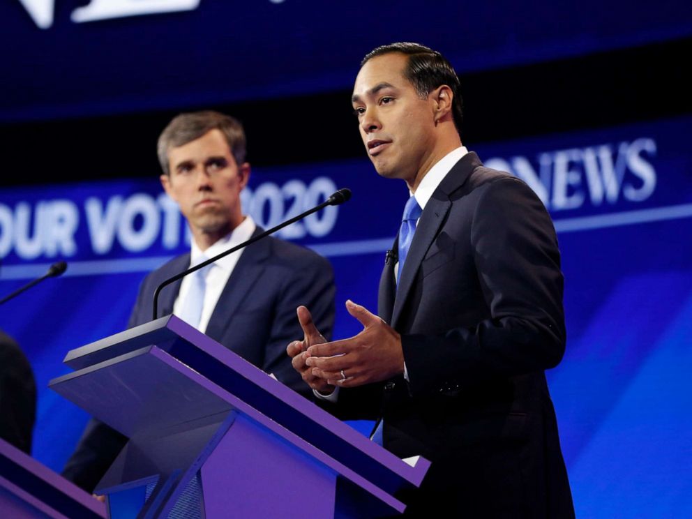 PHOTO: Beto ORourke watches while Julian Castro speaks during the third Democratic Primary Debate, in Houston, Sept. 12, 2019.