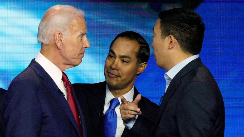 PHOTO: Democratic presidential candidates former Vice President Joe Biden, former Housing and Urban Development Secretary Julian Castro, and Andrew Yang talk Thursday, Sept. 12, 2019, after a Democratic presidential primary debate in Houston.