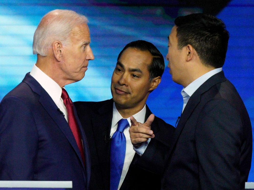 PHOTO: Democratic presidential candidates former Vice President Joe Biden, former Housing and Urban Development Secretary Julian Castro, and Andrew Yang talk Thursday, Sept. 12, 2019, after a Democratic presidential primary debate in Houston.