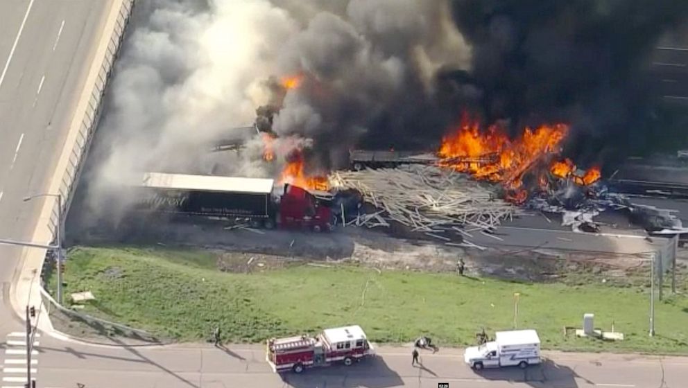 PHOTO: First responders battle flames after a fiery crash involving several cars and trucks on the eastbound lanes of Interstate 70 near Denver, April 25, 2019.