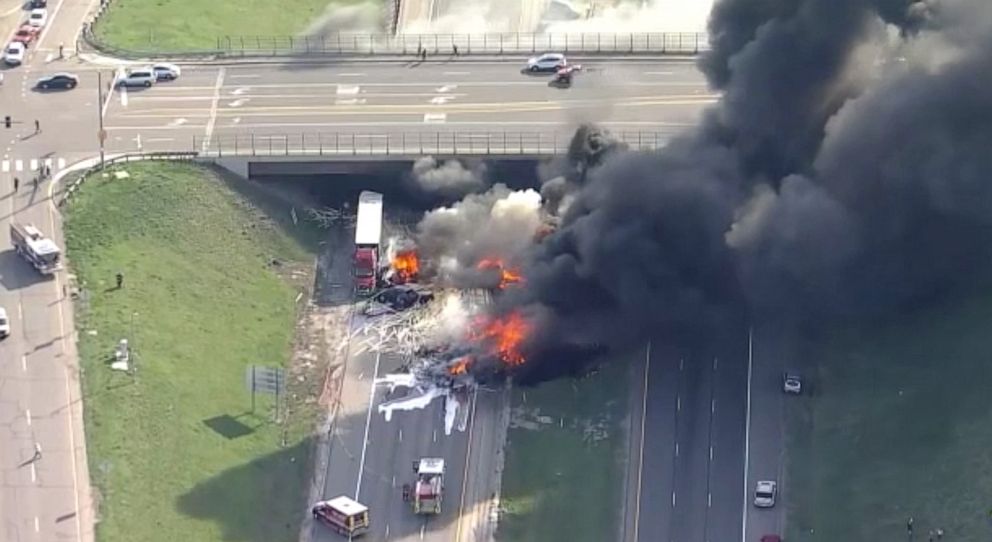 PHOTO: First responders battle flames after a fiery crash involving several cars and trucks on the eastbound lanes of Interstate 70 near Denver, April 25, 2019.
