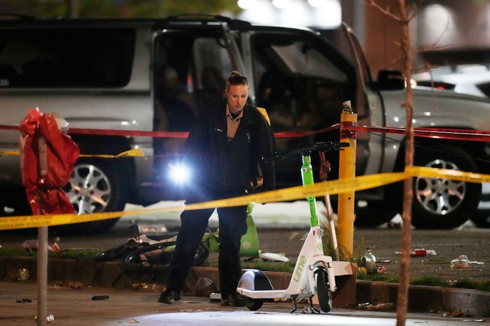 PHOTO: Denver Police Department investigators work the scene of a mass shooting early Tuesday, June 13, 2023, in Denver.