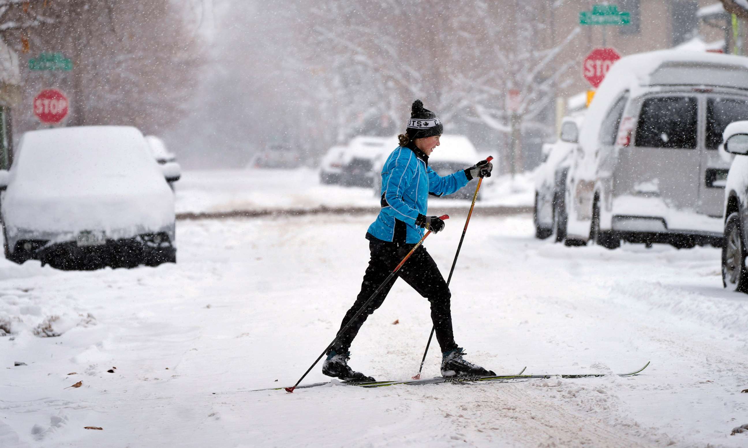PHOTO: A cross-country skier navigates the street after a winter storm packing heavy snow enveloped the intermountain West, Jan. 18, 2023, in Denver.