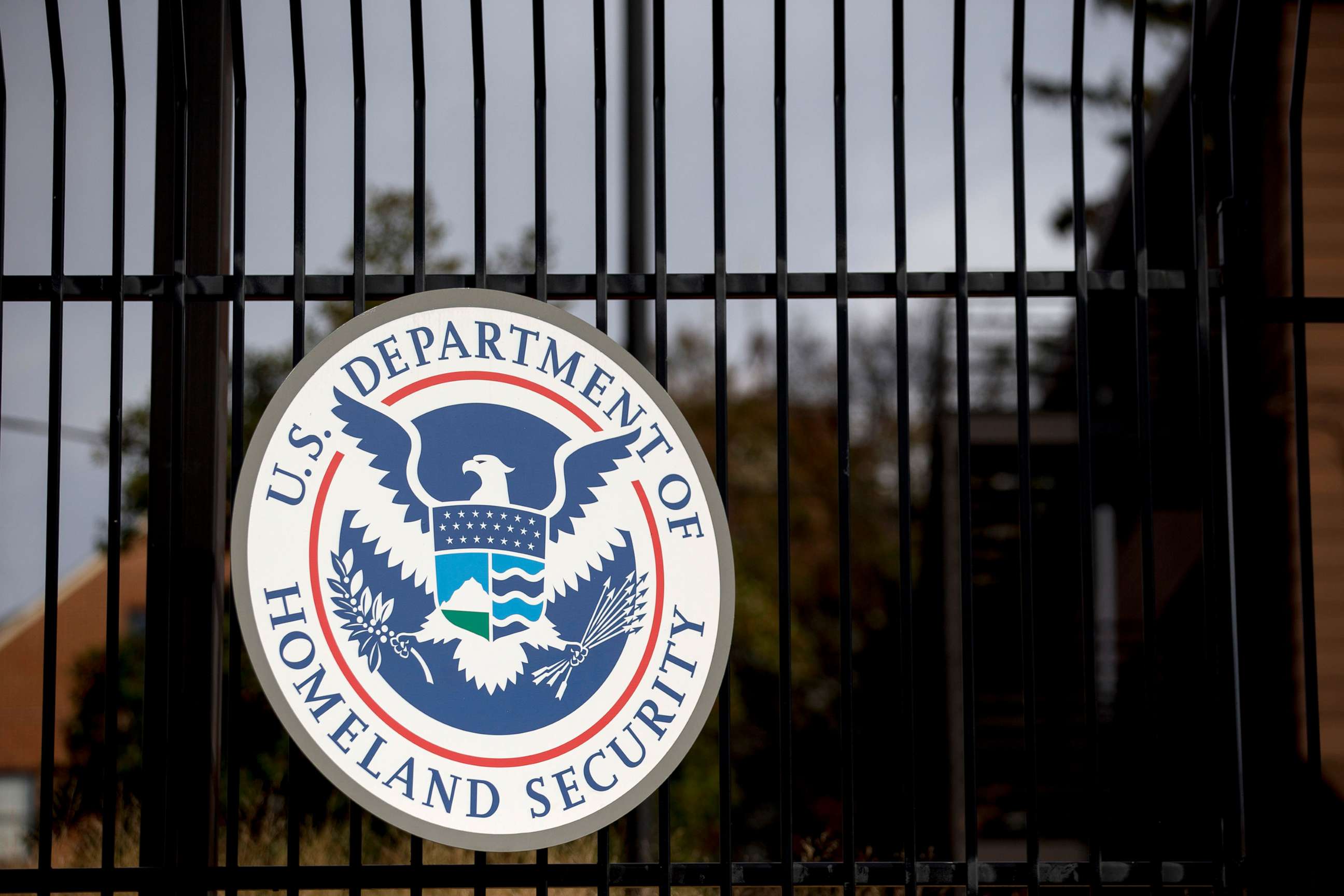 PHOTO: In this Dec. 11, 2014, file photo, the U.S. Department of Homeland Security (DHS) seal hangs on a fence at the agency's headquarters in Washington, D.C.