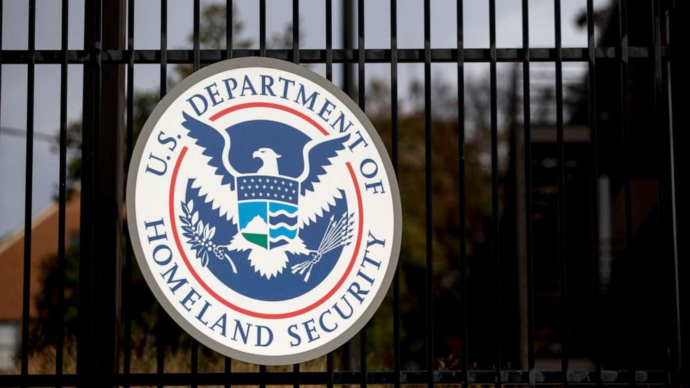 PHOTO: In this Dec. 11, 2014, file photo, the U.S. Department of Homeland Security (DHS) seal hangs on a fence at the agency's headquarters in Washington, D.C.
