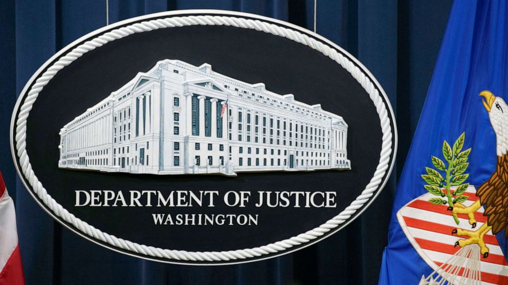 PHOTO: A Department of Justice seal is shown before Attorney General Merrick Garland speaks during a news conference, Feb. 22, 2022 at the Justice Department in Washington.