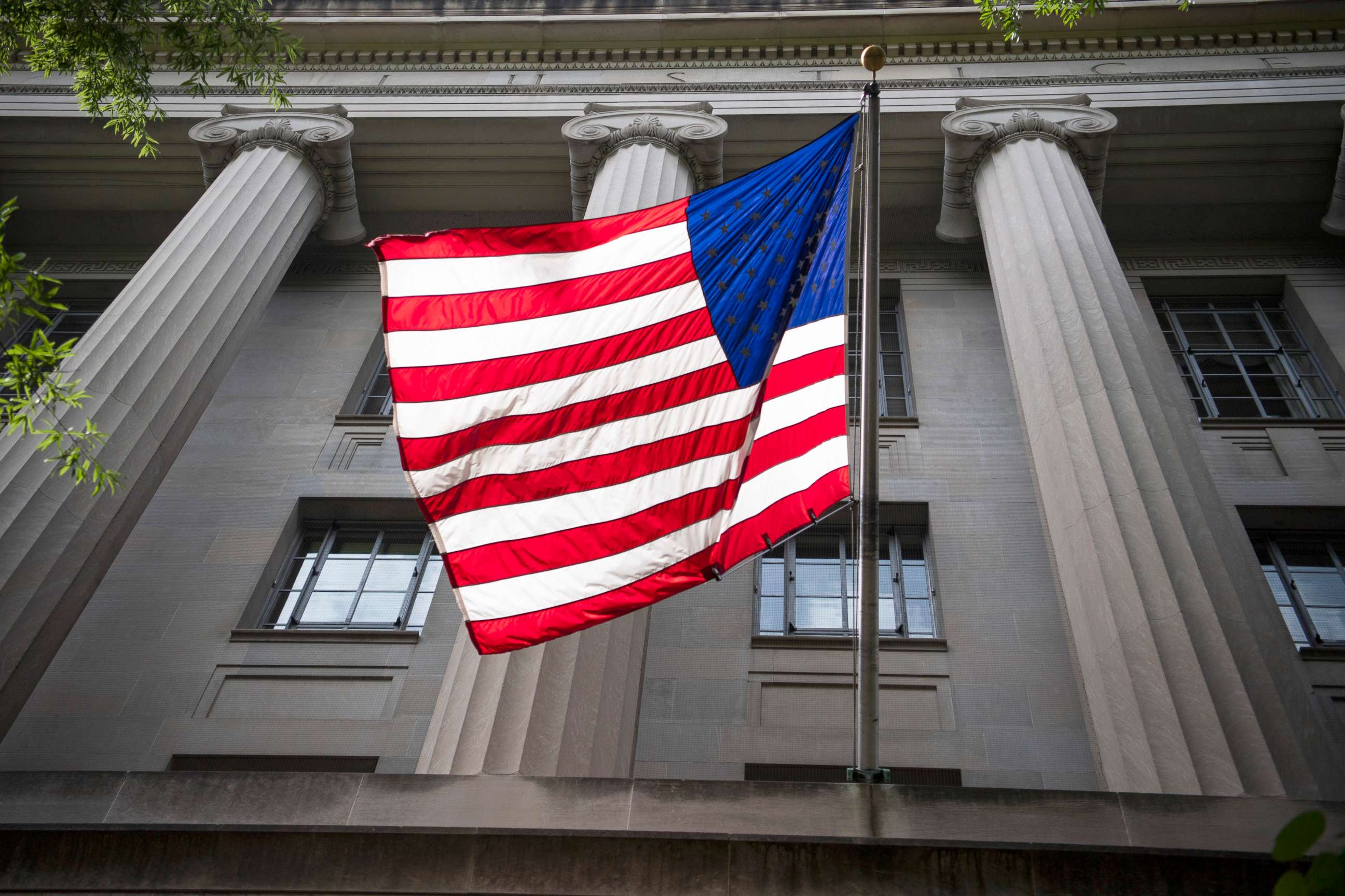 PHOTO: An American flag is displayed on the Pennsylvania Avenue side of the Department of Justice, June 3, 2020.