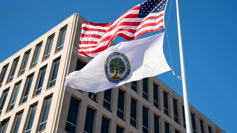 PHOTO: Flags for the U.S. and the U.S. Department of Education fly outside the Department of Education building in Washington, D.C., Aug. 18, 2020.