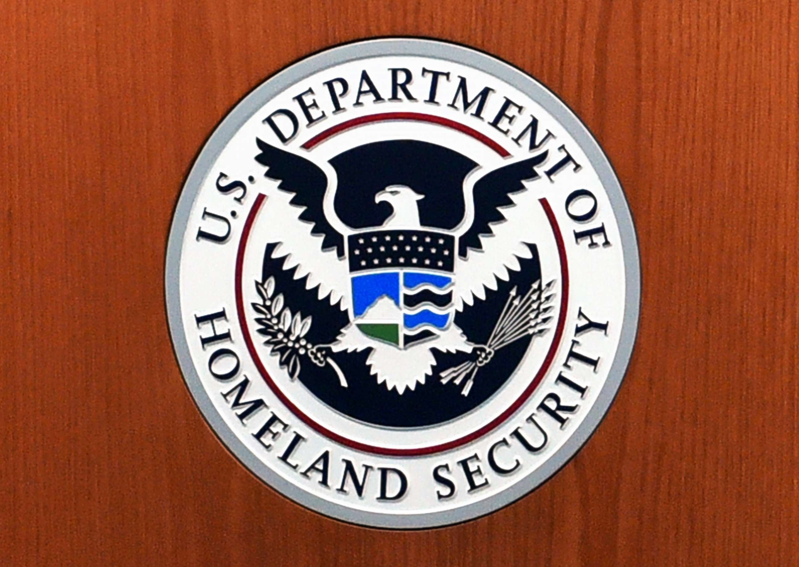 PHOTO: The seal of the US Department of Homeland Security in the US Customs and Border Protection Press Room at the Reagan Building in Washington, DC., March 6, 2017.