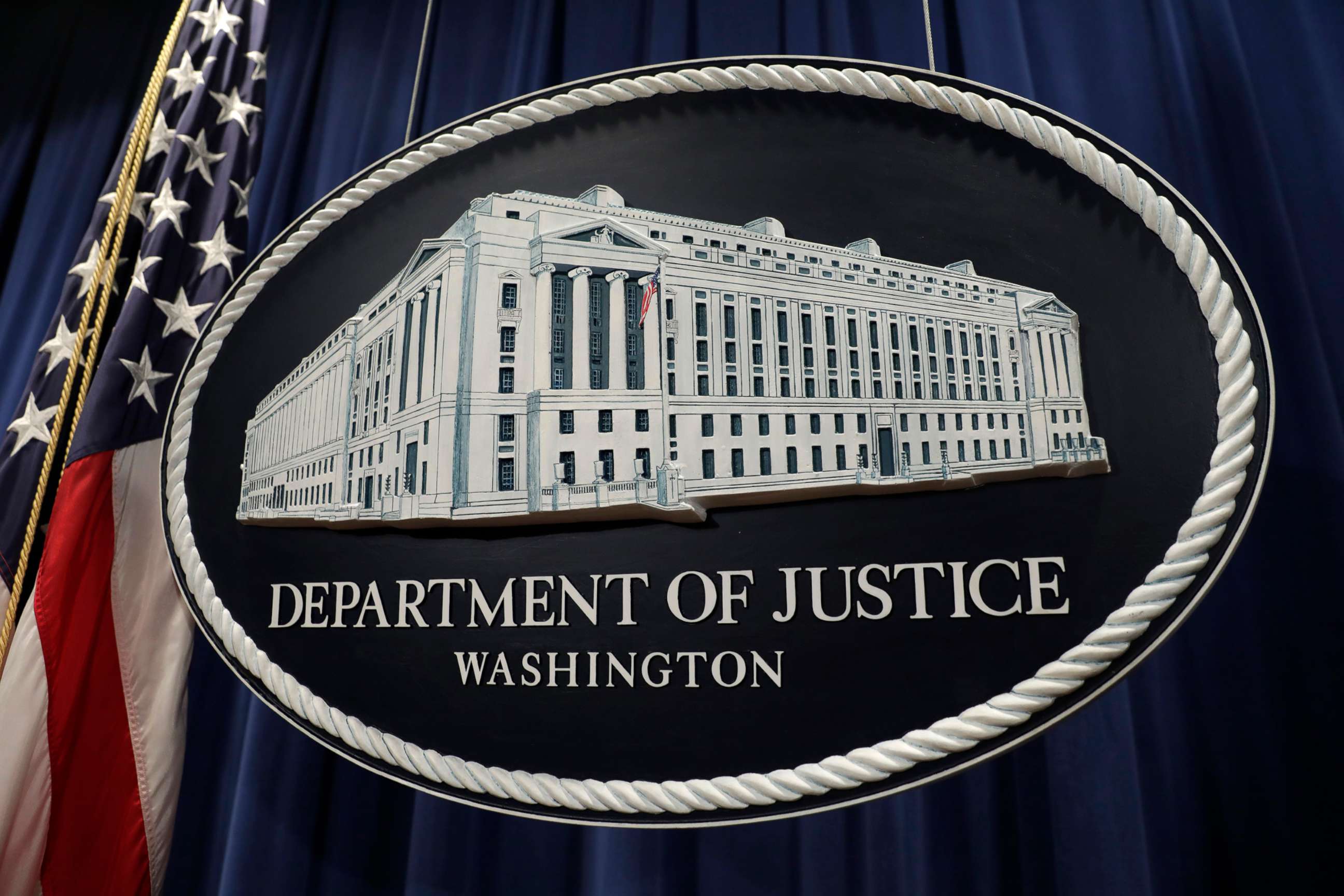 PHOTO: The U.S. Department of Justice seal is displayed following a news conference with Rod Rosenstein, deputy attorney general, not pictured, in Washington, D.C., Dec. 20, 2018.