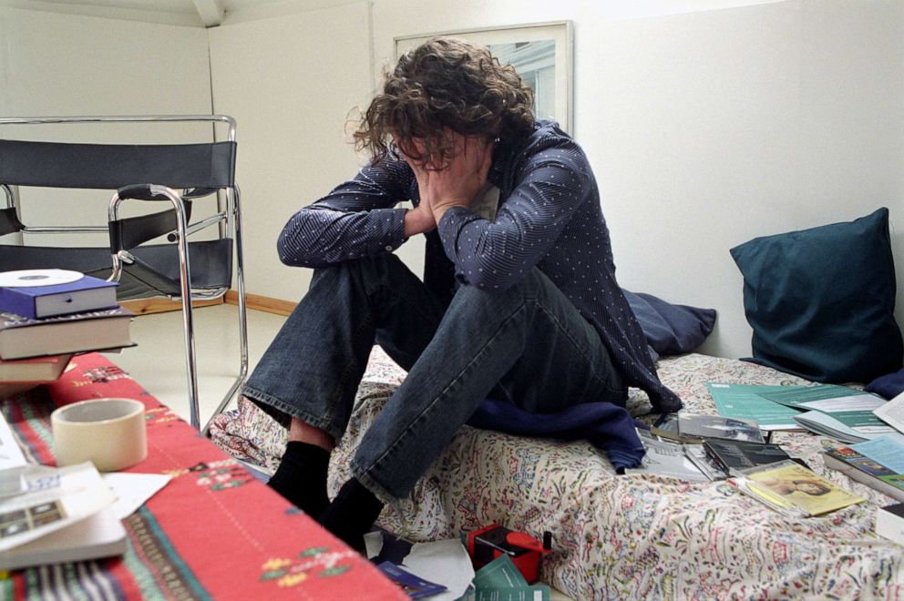 PHOTO: DA depressed and stressed university student hold his face in his hands in this undated stock image. 