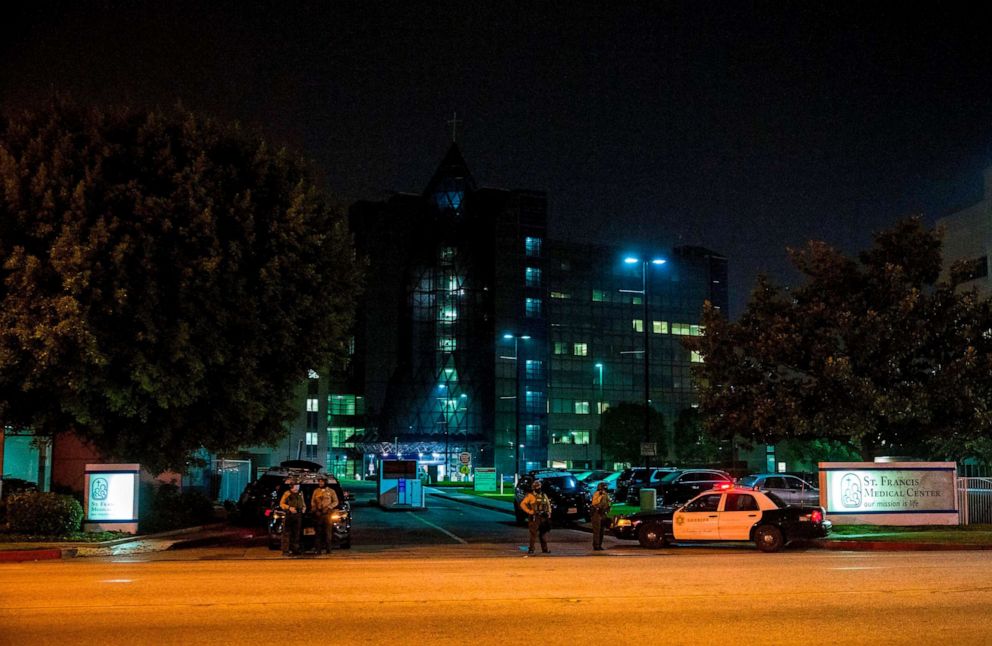 PHOTO: Los Angeles County Sheriff's deputies guard the entrance to St. Francis Medical Center early Sept. 13, 2020, after two deputies were shot late Saturday, Sept. 12, while sitting inside their patrol vehicle guarding a Metro station in Compton, Calif.