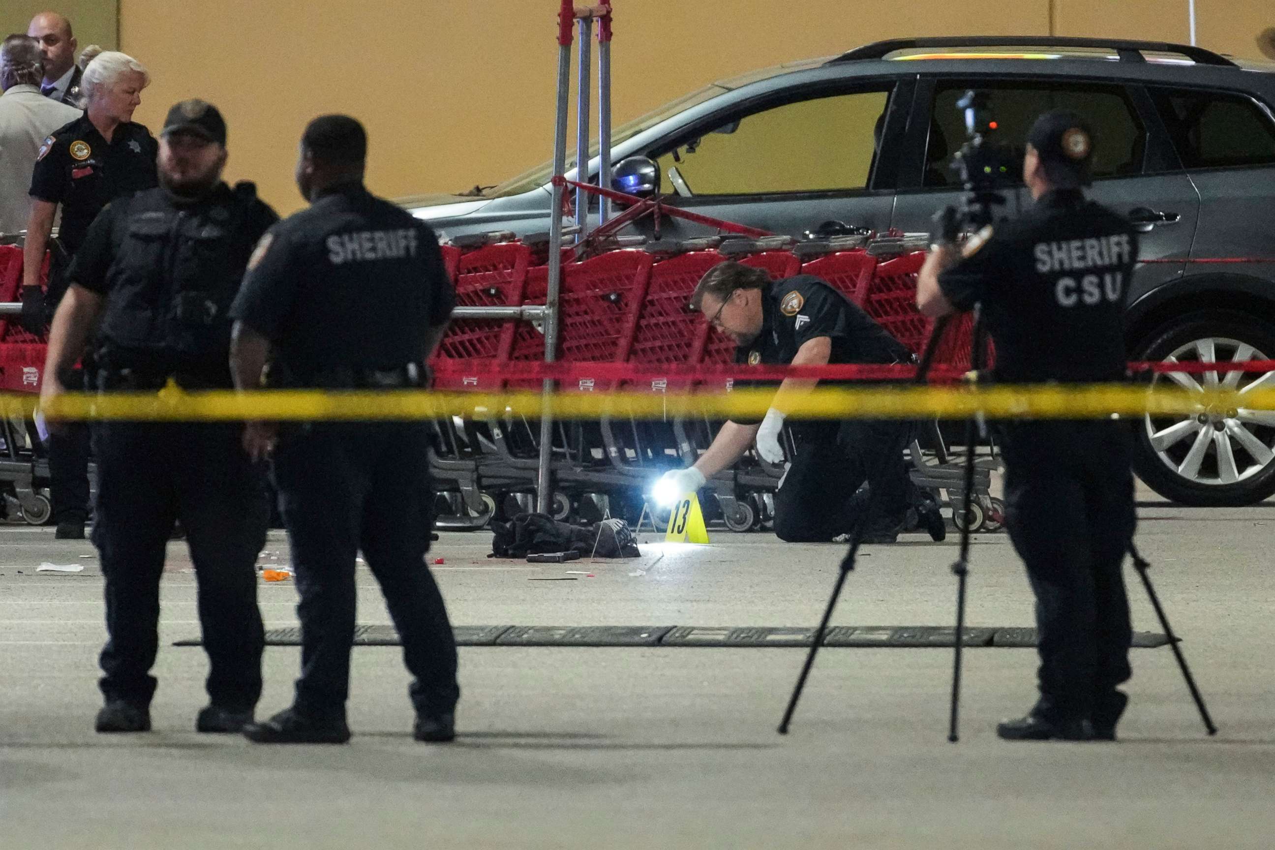 PHOTO: Law enforcement officers investigate the scene of shooting, March 31, 2022 in Houston.