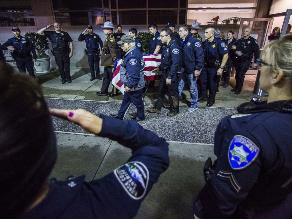 PHOTO: Officers and medical staff take part in a procession for officer Daniel McCartney, of Yelm, at St. Joseph Medical Center in Tacoma, Wash., Jan. 8, 2018.