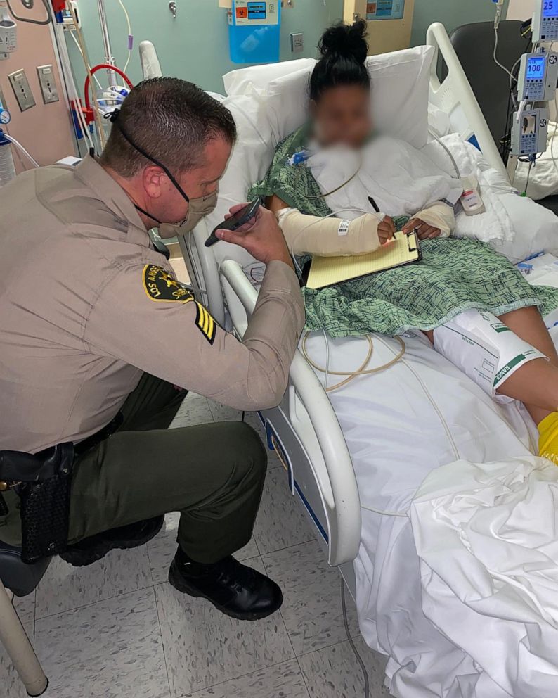 PHOTO: Sgt. Frederickson, from the Los Angeles County sheriff's office, visits a female deputy who was shot during an ambush as seen in photo posted in the Lost Hills Sheriff's Station Facebook account.