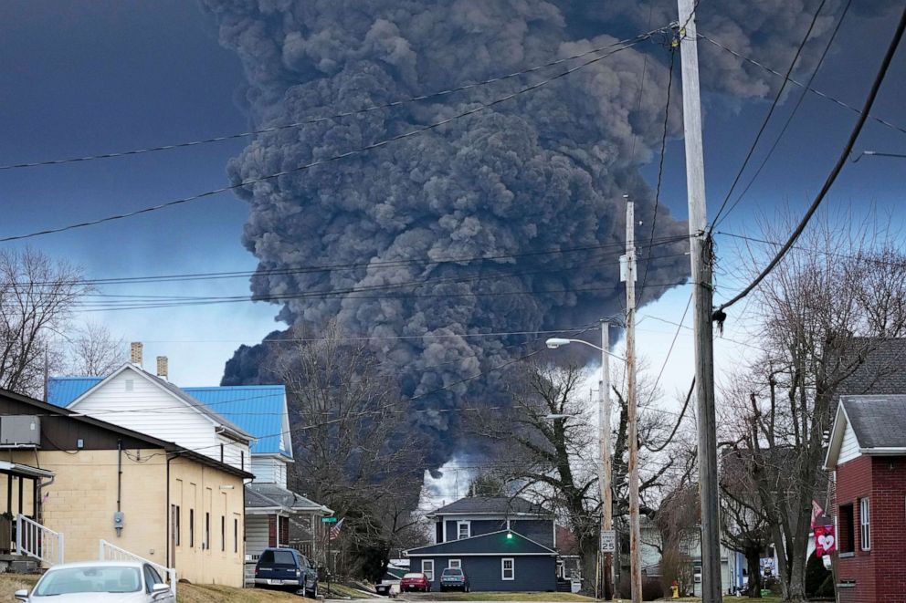 PHOTO: A large plume of smoke rises over East Palestine, Ohio, on Feb. 6, 2023, after a controlled detonation of a portion of the derailed Norfolk Southern Railway train.