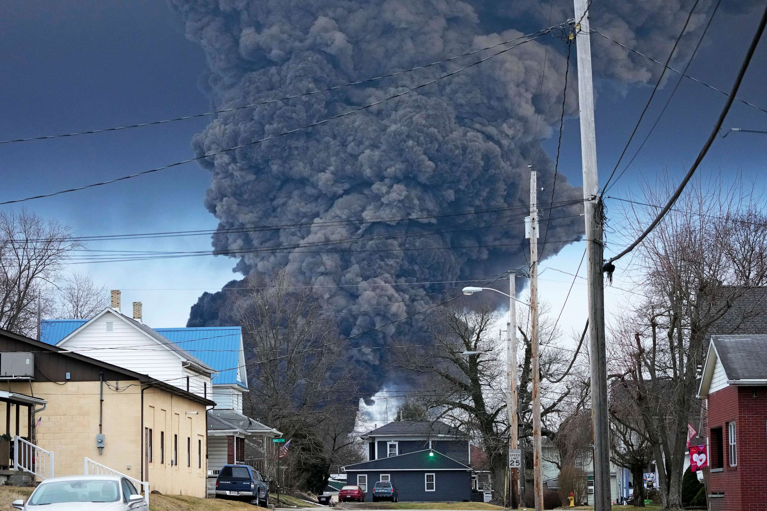 PHOTO: A large plume of smoke rises over East Palestine, Ohio, after a controlled detonation of a portion of the derailed Norfolk Southern trains Monday, Feb. 6, 2023.