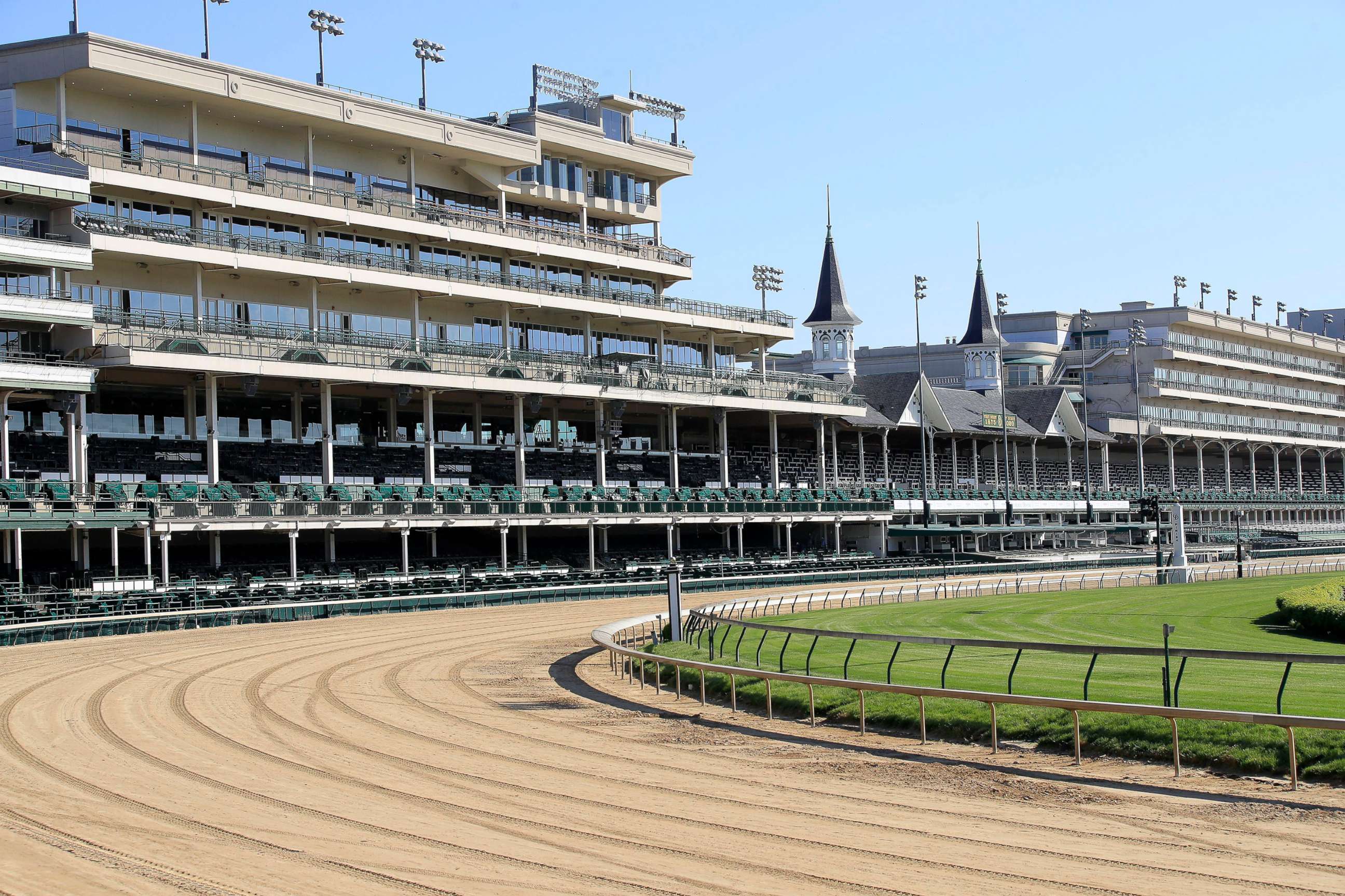 PHOTO: A view of the twin spires and empty grandstand from the first turn at Churchill Downs, May 2, 2020, in Louisville, Ky.  