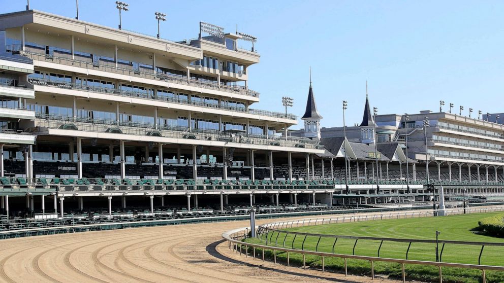 PHOTO: A view of the twin spires and empty grandstand from the first turn at Churchill Downs, May 2, 2020, in Louisville, Ky.  