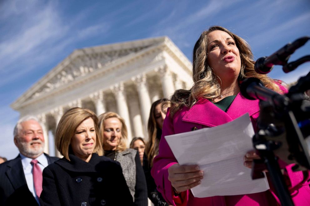 PHOTO: Lorie Smith, a Christian graphic artist and website designer from Colorado, right, speaks outside the Supreme Court in Washington, D.C., Dec. 5, 2022, after her case was heard before the Supreme Court.