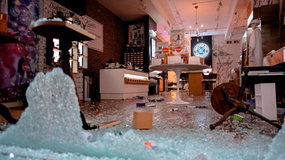 PHOTO: A looted and destroyed shop is seen after a night of protest over the death of African-American man George Floyd in Minneapolis on June 1, 2020 in Lower Manhattan in New York City.