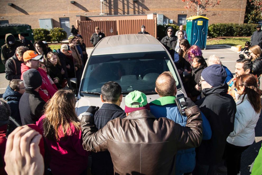 PHOTO: Protesters surround government vehicle after Samuel Oliver, 47, a Mexican undocumented citizen, was arrested after going to an appointment with immigration officials on November 23 2018, in Morrisville, NC