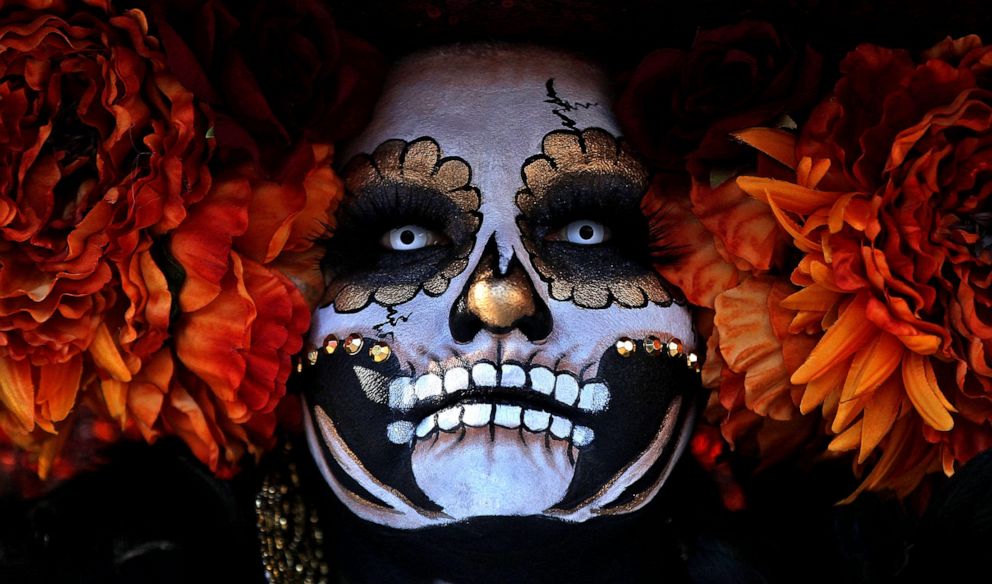 PHOTO: Aracely Marquez poses for a photo during the Dia de los Muertos event in San Angelo, Texas, Oct. 30, 2021.