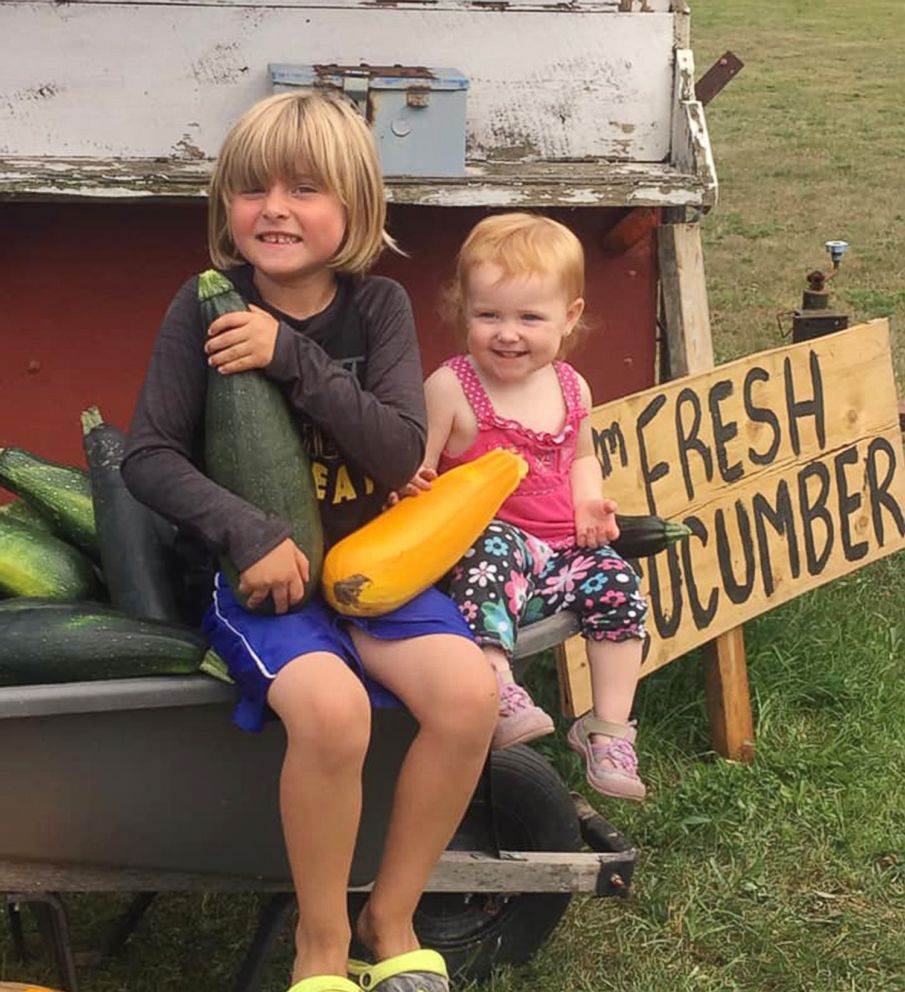 PHOTO: Ian Christensen, 6, from Sand Lake, Michigan, poses for a photo with his younger sister.