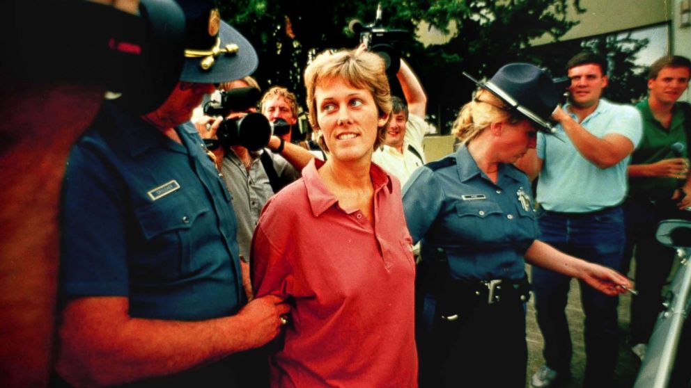 PHOTO: Elizabeth Diane Downs, the convicted childkiller who escaped July 11, 1987 from the women's prison in Salem, Ore., is escorted out of state police headquarters in Salem following  her capture July 21, 1987.